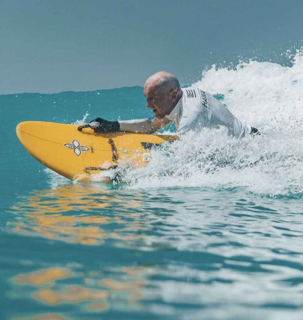 Spike Kane surfing