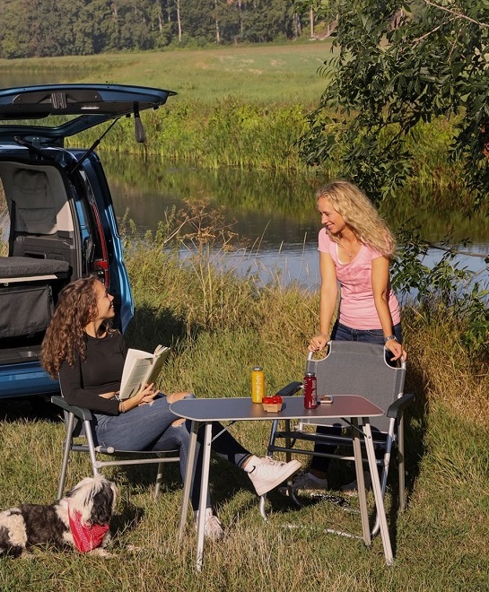 female couple and campervan